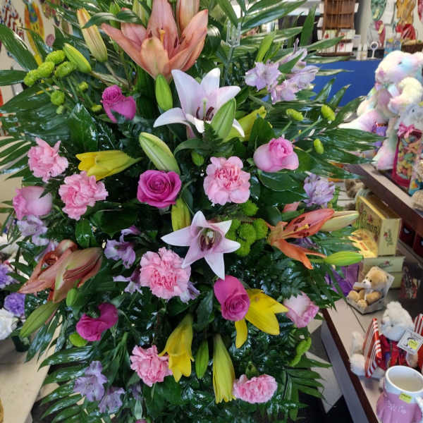 Large mixed bouquet with lilies, roses, and carnations
