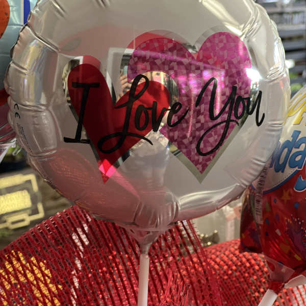 Heart-shaped balloon with "I Love You" text