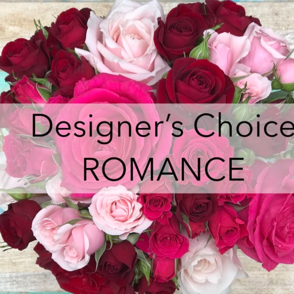 Assorted pink and red roses with the words "Designer’s Choice ROMANCE" overlaid.