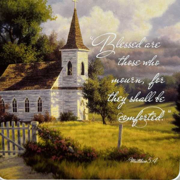 A church with a steeple and a Bible verse over a pastoral landscape