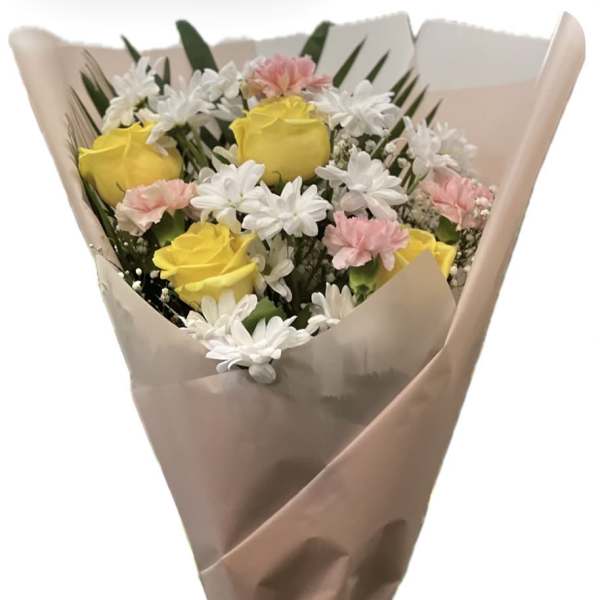 Bouquet of yellow roses, white daisies, and pink carnations wrapped in tan paper