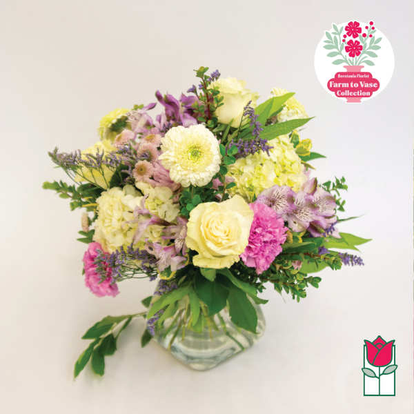 Mixed pastel bouquet in a clear glass vase