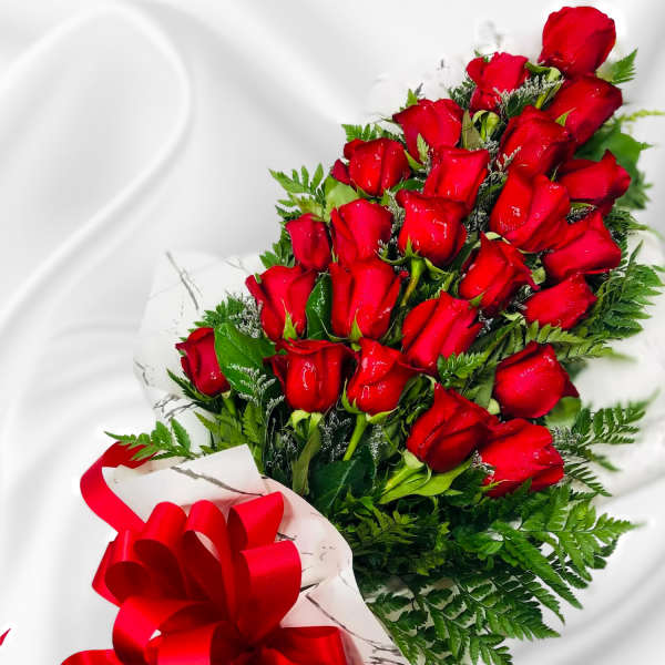 Bouquet of red roses with a red ribbon bow