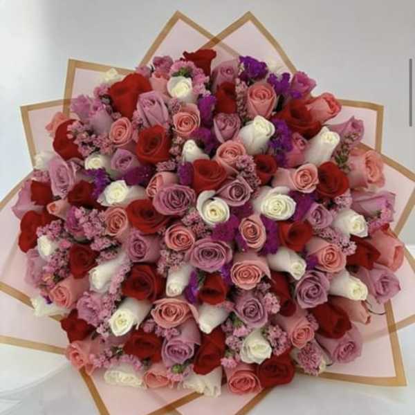 Large bouquet of red, pink, white, and purple roses