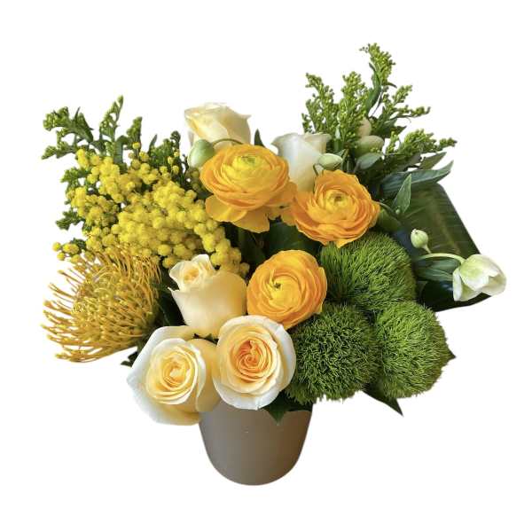Yellow and white roses with green pom-pom blooms in a vase