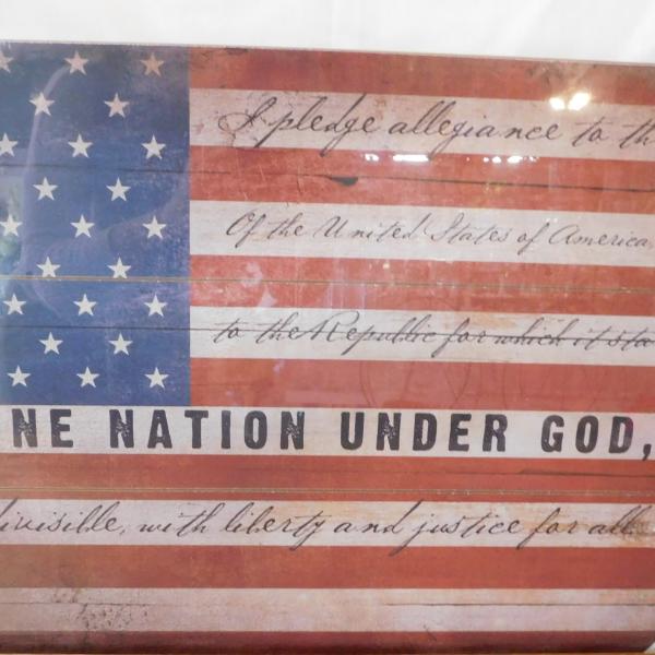 Framed American flag print with patriotic text