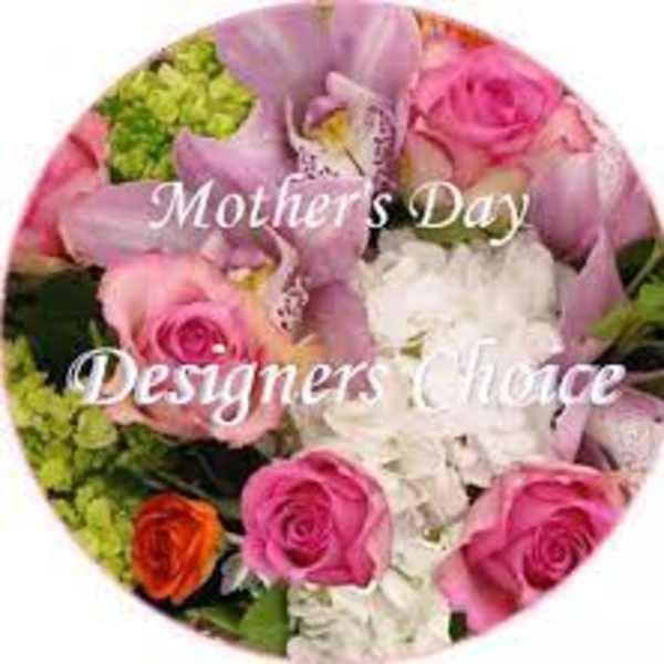 Round bouquet of pink and white roses with green accents