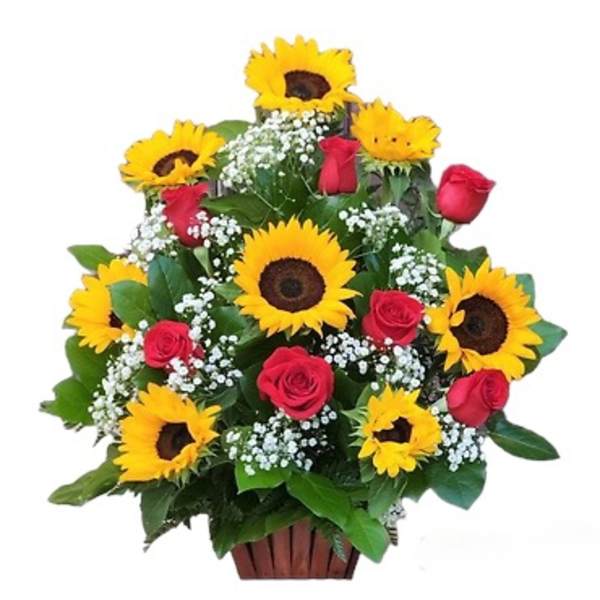 Sunflowers and red roses arranged in a basket