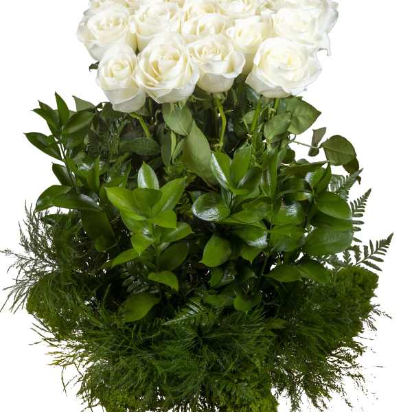 White rose bouquet with dense green foliage