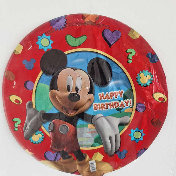Round Mickey Mouse birthday balloon with colorful icons and "Happy Birthday" text