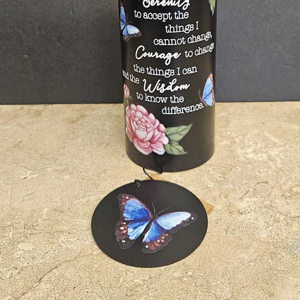 Black cylindrical holder with a Serenity prayer and butterfly and flower designs