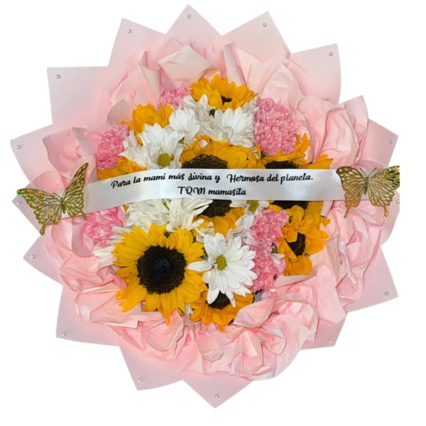 Pink-wrapped bouquet of sunflowers, white daisies, and pink blooms with a ribbon