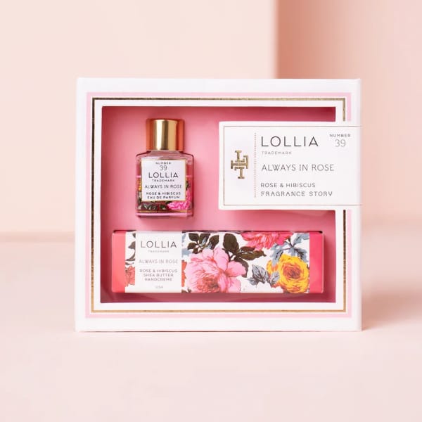 Rose-themed fragrance and hand cream gift set in a pink box