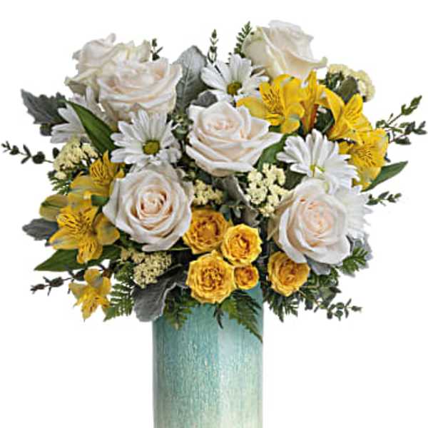Bouquet of white roses, yellow flowers, and daisies in a teal vase