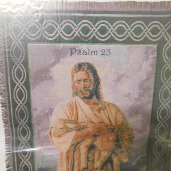 Framed religious wall hanging with Psalm 23 and an image of Jesus
