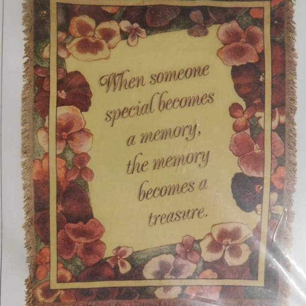 Floral memorial throw blanket with a quote in the center