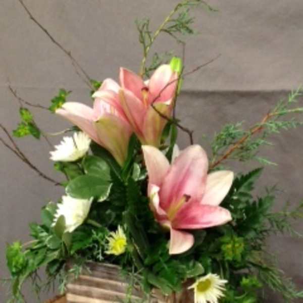 rustic wooden box with lilies