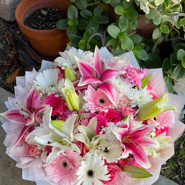 Pink and white bouquet with lilies, gerbera daisies, and roses