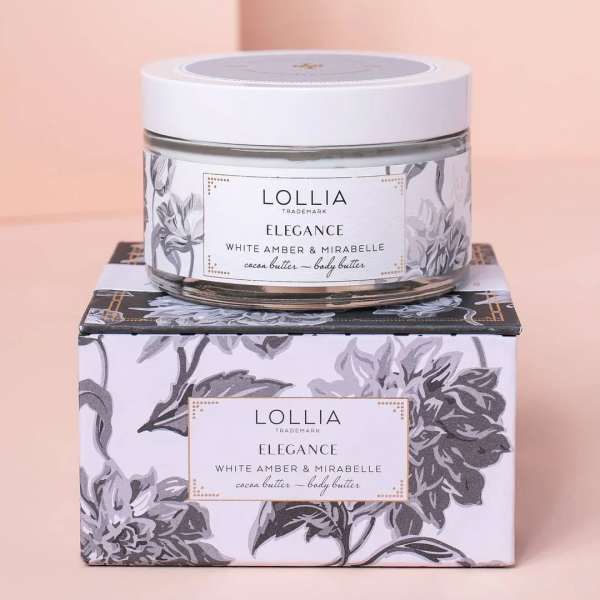 Jar of body butter on a floral-patterned box