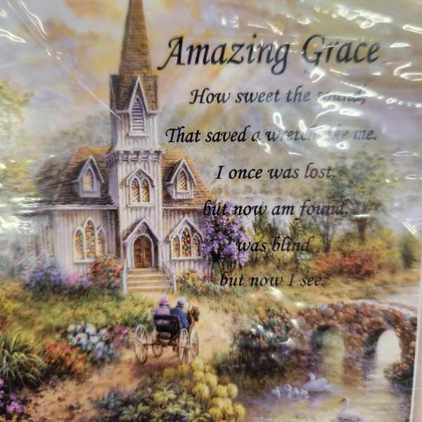 Printed church scene with the words "Amazing Grace" and a verse