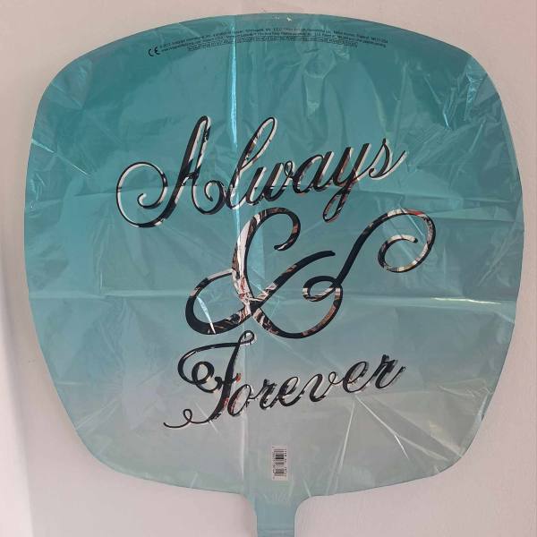 Teal foil balloon with silver script text reading “Always & Forever.”