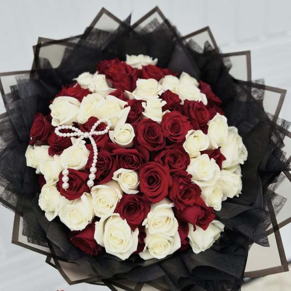 Red and white hand bouquet.