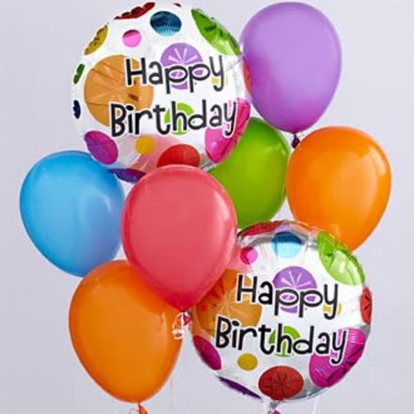 Cluster of colorful birthday balloons, including two "Happy Birthday" balloons