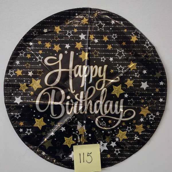 Round black birthday balloon with gold and white stars
