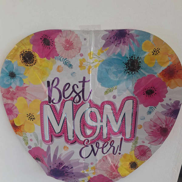 Heart-shaped balloon with floral print and "Best Mom Ever" text
