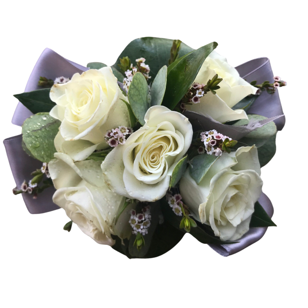 Bouquet of white roses with small filler flowers and lavender wrapping