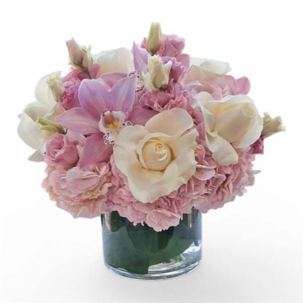 Pink and white bouquet in a glass vase