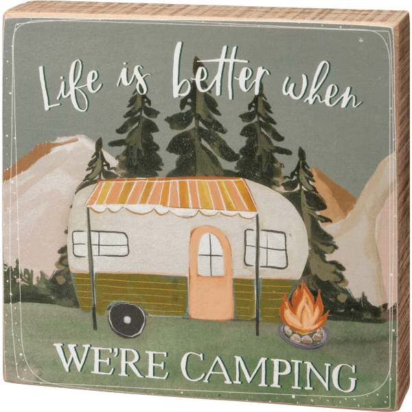 Decorative wooden sign with a camper and the words 'Life is better when we're camping'