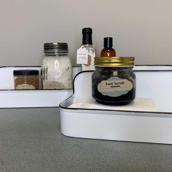 Gift trays with bath and body products in jars and bottles