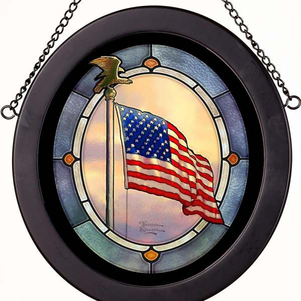Round stained-glass panel with an American flag and eagle topper in a black frame