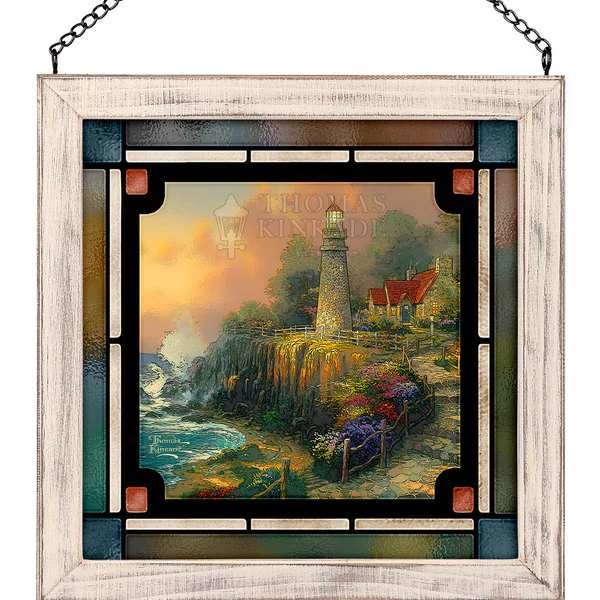 Framed stained-glass-style wall art with a lighthouse scene