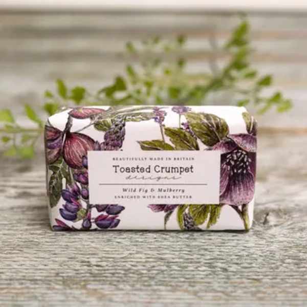 Wrapped soap bar with a floral print label