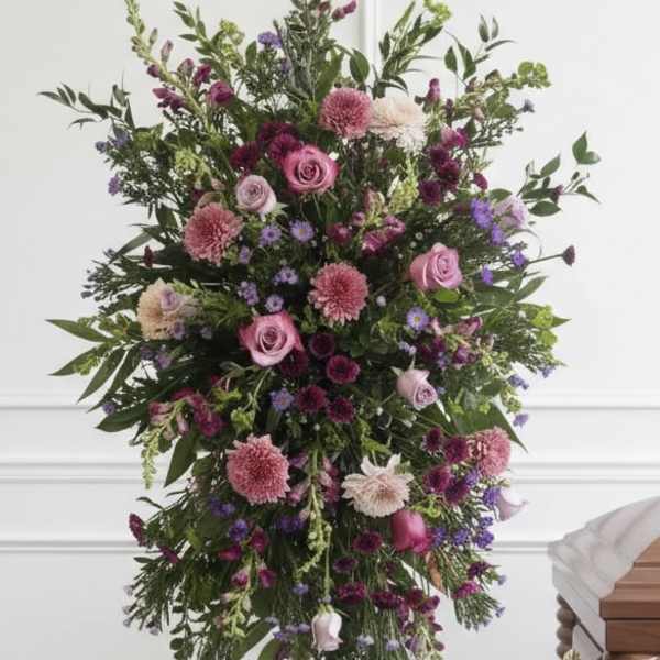 Tall standing floral spray with pink and purple blooms