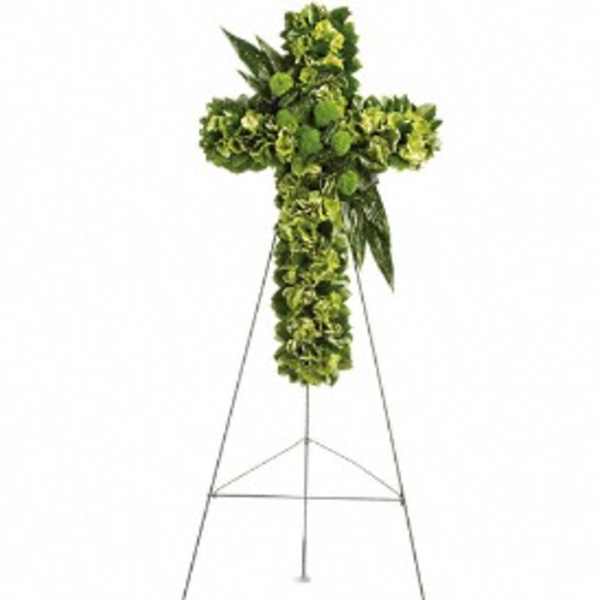 Green floral cross on a metal stand