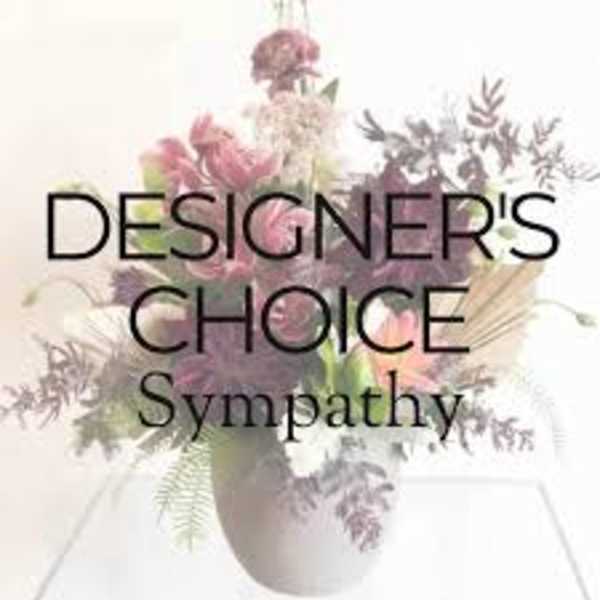 Pink and purple floral arrangement in a white vase with sympathy text overlay