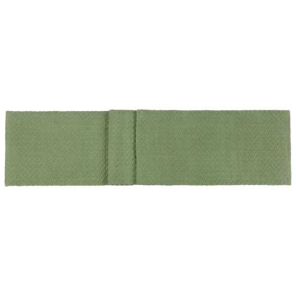 Green textured ribbon bow on a white background