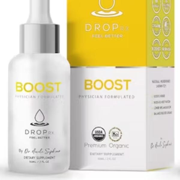 White dropper bottle beside a yellow and white product box