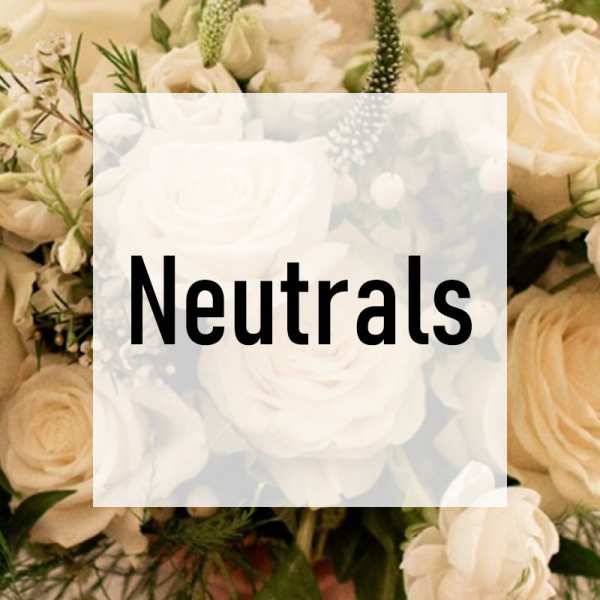 Cluster of cream and white roses with neutral-toned blooms and the word Neutrals overlaid in bold text