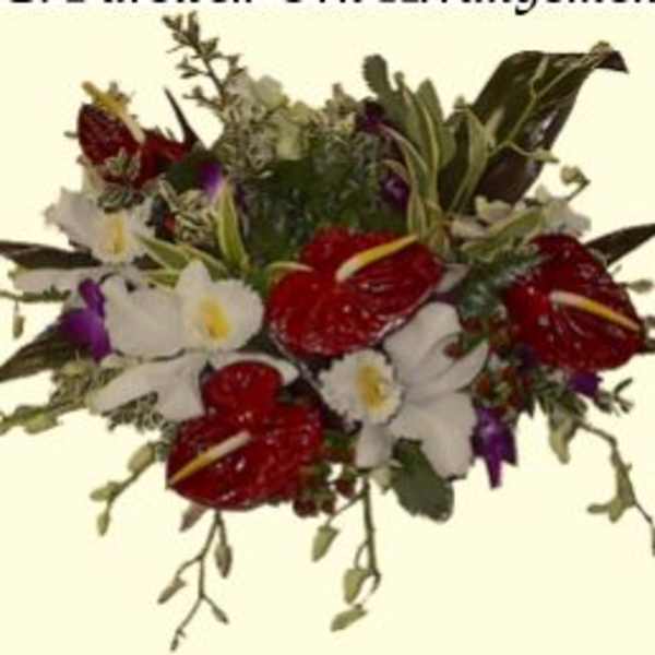 Mixed bouquet with red anthuriums and white flowers