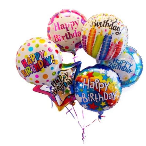 Cluster of colorful birthday balloons with printed messages