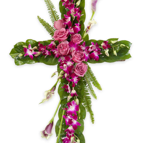 Cross-shaped floral arrangement with pink roses and purple orchids