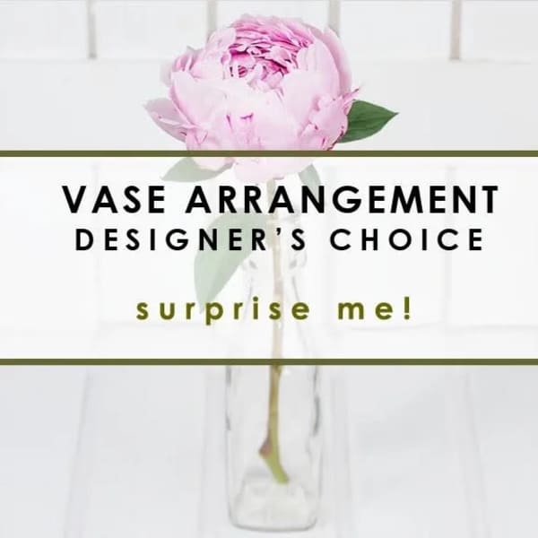 Single pink flower in a clear glass vase with text overlay