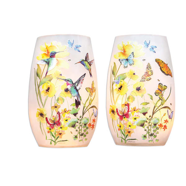 Pair of frosted glass candle holders with butterfly and flower designs