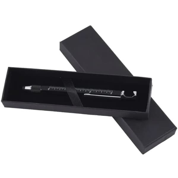 Black gift box holding a pen-like tool on a white background