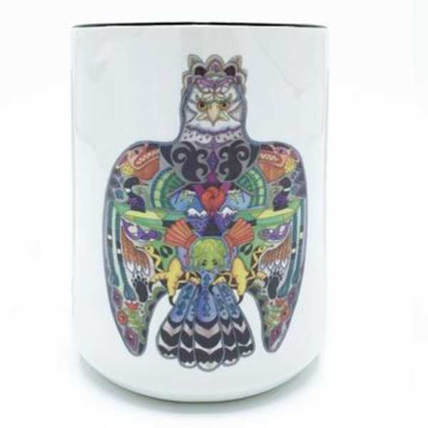 White ceramic mug with a colorful owl illustration