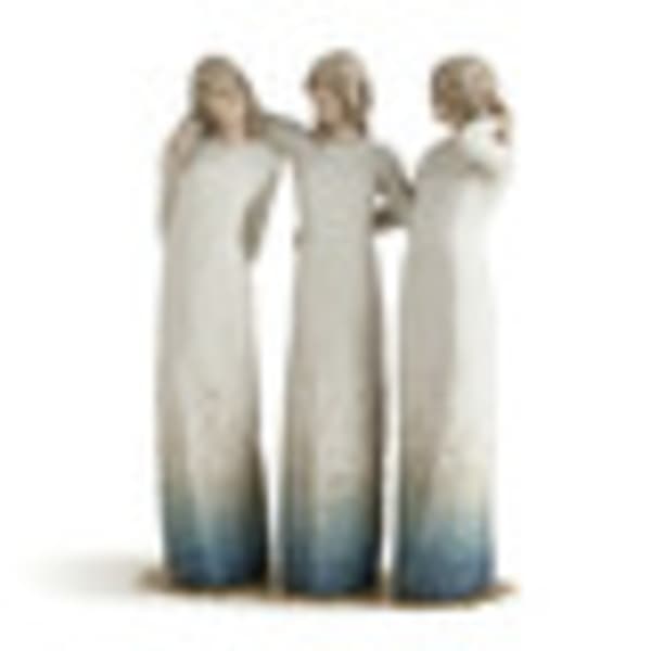 Three blurred figures in long white dresses standing together